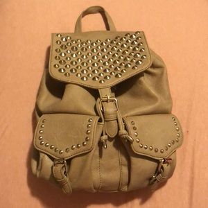 BUCKLE Studded Drawstring Flap Backpack